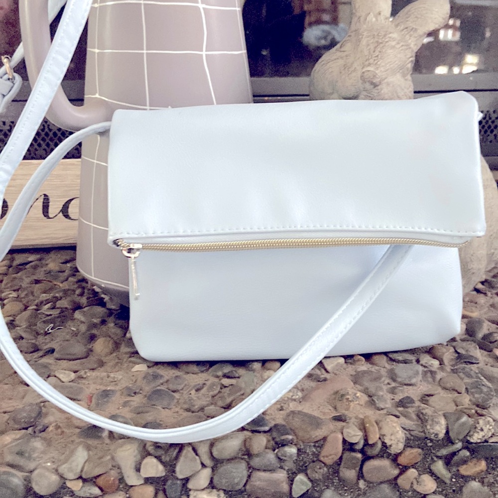 Brand-new without tags dusty baby blue Spring purse.